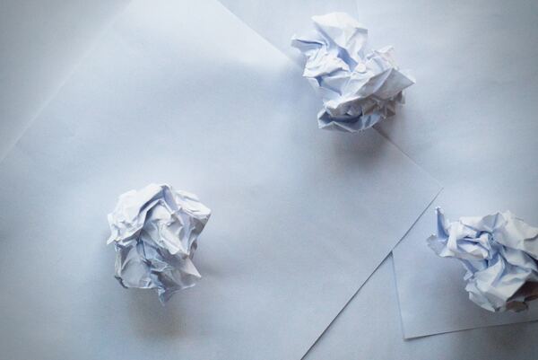 Fractal dimensions of crumpled paper